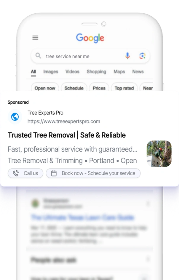Smartphone displaying a Google search result for a lawn care business with a sponsored ad.